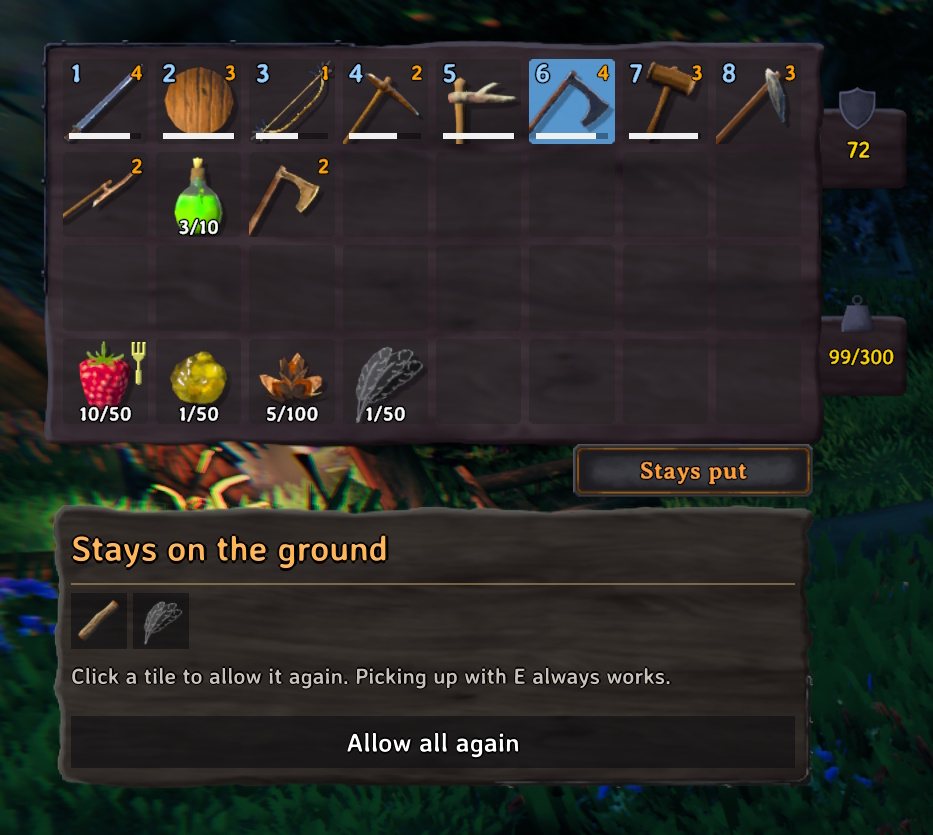 The inventory with the Stays put button and the open list: wood and feathers stay on the ground